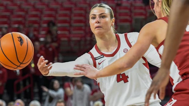 Razorbacks Saylor Poffenbarger passes ball against Alabama